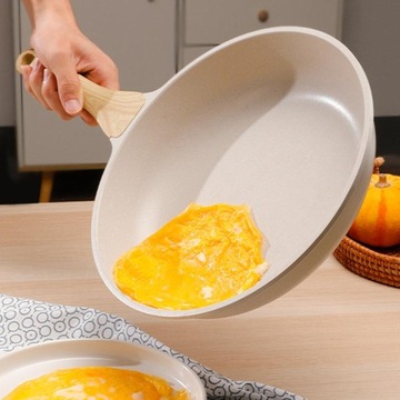 Patelnia z powłoką nieprzywierającą z rączką z białej powłoki granitowej. Średnica kamienia 20 cm