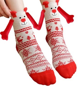 Рождественский подарок, рождественские носки, держась за руки.