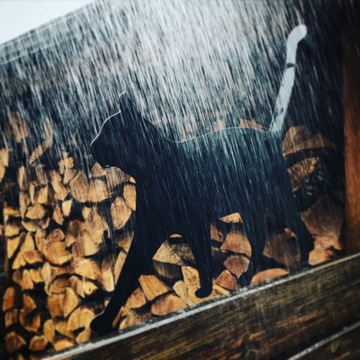 Кот Лолек – садовое украшение для забора.