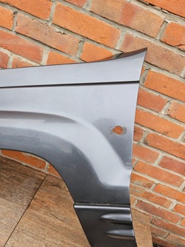 JEEP GRAND CHEROKEE WJ 99-04R BŁOTNIK LEWY PRZÓD ZDROWY