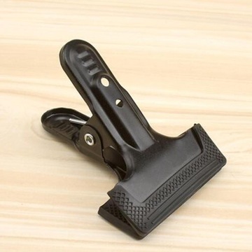 Большие фиксирующие зажимы для скрепки для бумаг диаметром 105 мм.