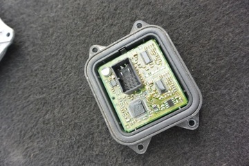 MODUL ZÁHYB SVĚTLA XENON BMW X5 X6 E90 E70 E71