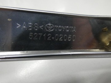 CHRÓM LIŠTA NÁRAZNÍKU LEVÝ TOYOTA COROLLA E21 SEDAN HATCHBACK