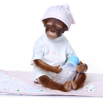 Oczy zamknięte małpa lalka różowy kapelusz 52 cm