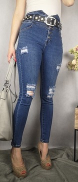 Spodnie jeans rurki z przetarciami dziurami 36