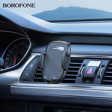 Зажим-держатель для телефона на дефлектор автомобиля.