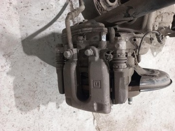 ZACISK HAMULCOWY TYLNY PRAWY OPEL ASTRA K V