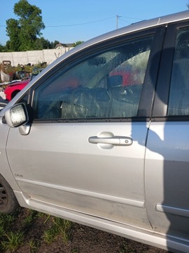 DVEŘE LEVÝ PŘEDNÍ SUZUKI LIANA 04 STŘÍBRNÉ KOMPLETNÍ