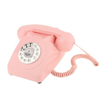 Staromodny telefon stacjonarny na biurko w kolorze różowym