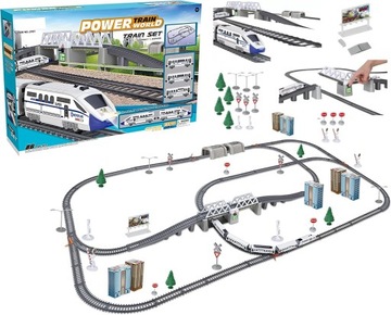 KOLEJKA ELEKTRYCZNA POCIĄG LOKOMOTYWA DUŻY TOR BUDYNKI ZNAKI MOST 9m
