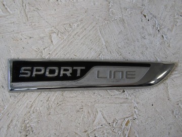Skoda Superb III emblemat błotnika prawego