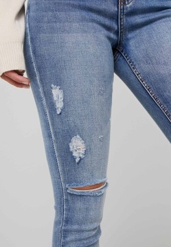 Jeansy z przetarciami Missguided 40