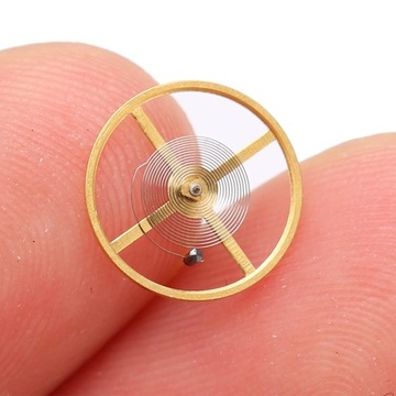 КОЛЕСО БАЛАНСА ЧАСОВ С ВОЛОСОВОЙ ПРУЖИНОЙ