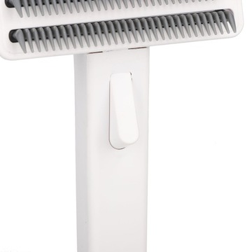 Щетка для расчесывания собачьей шерсти.