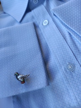 Захватывающие запонки в виде голубя