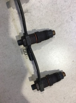 ИНЖЕКТОР MAZDA 323F BJ 2.0 D