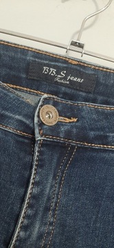 1058. BB S Jeans granatowe jeansy rurki z zamkami i cyrkoniami r 40