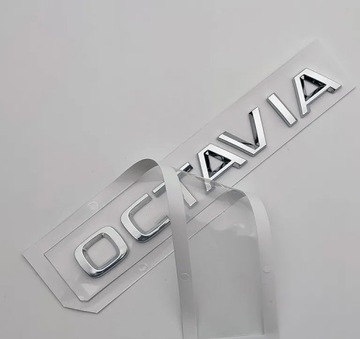 ЭМБЛЕМА SKODA OCTAVIA, НАДПИСЬ, НА КОЛЕНЯХ
