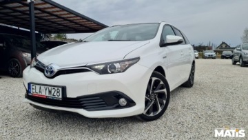 Toyota Auris II Touring Sports Facelifting 1.8 Hybrid 136KM 2016 Toyota Auris 1.8Hybryda Panorama Navi kamera climatronic 100 bezwypadek, zdjęcie 21
