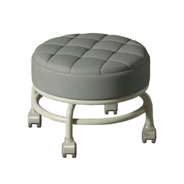 Niski, okrągły stołek na kółkach Low Rolling Seat w kolorze szarym