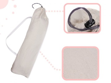 Кресло-гамак в бразильском стиле с подушками цвета экрю и деревянным оголовьем.