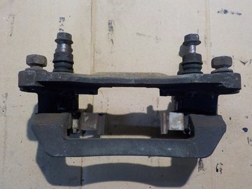 SUBARU LEGACY IV 03-09 JARZMO ZACISKU LEWY TYL