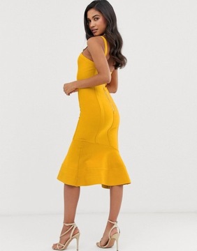 Żółta bandażowa sukienka midi z asymetrycznym 36
