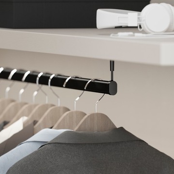 Черная овальная сквозная штанга для шкафа.