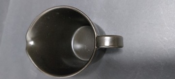 Дизайн старого керамического молочника