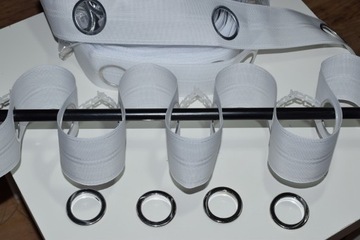 ЛЕНТА ЖЕСТКАЯ С ЛЮСНЯМИ для штор шириной 8см.