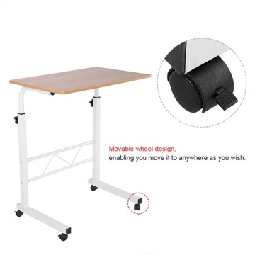 Компьютерный стол с регулируемой высотой, стоящий на столе, с передвижным диваном рядом с кроватью.