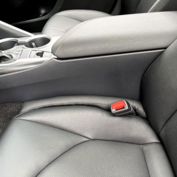 Набор подушек, заполняющих пространство между сиденьями