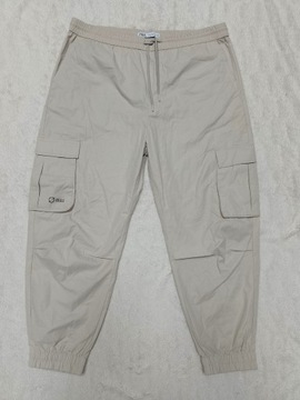 Spodnie materiałowe damskie H&M XL kremowe