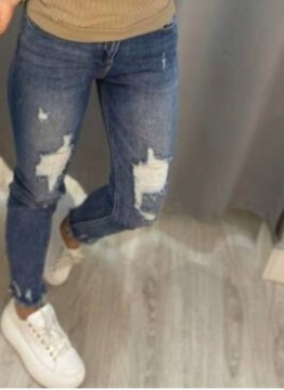 By o la la ! Spodnie jeans z przetarciami XL