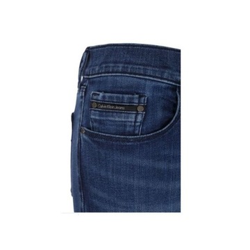 CALVIN KLEIN granatowe SPODNIE jeansowe W25 L30