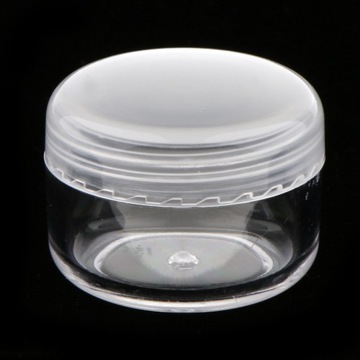 Маленькие пластиковые косметические баночки для кремов.