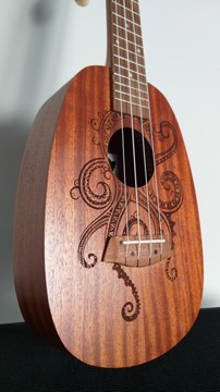 Концертная укулеле, красивый звук, интересный стиль.