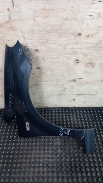 FIAT GRANDE PUNTO BŁOTNIK PRZÓD PRAWY 634/C