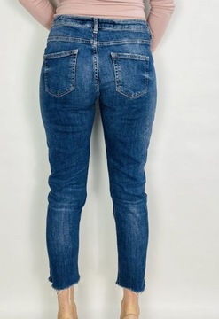 Jeansowe elastyczne spodnie rurki dziury XL 42 Denim Co.