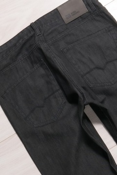 HUGO BOSS ORANGE BLACK RIGID SPODNIE JEANSY 34/34