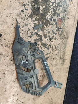 SKODA OCTAVIA II ŚLIZG POD LAMPE LEWY PRZÓD PRZEDNI