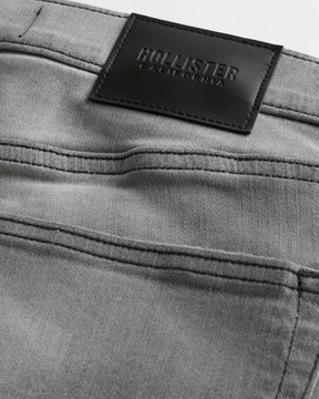 Jeansy skinny z przetarciami HOLLISTER 30/32