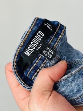 Jeansowe elastyczne spodnie rurki dziury XL 42 MissGuided