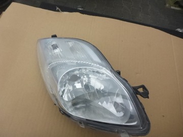 TOYOTA YARIS II LIFT 09-11 PRAWY REFLEKTOR ORYGINAŁ EUROPA