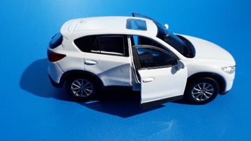 Модель Mazda CX-5 из белого металла WELLY 1:34