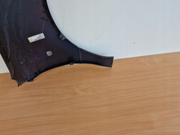 SUZUKI SWIFT MK3 LEVÝ BLATNÍK PŘEDNÍ 5771160B21
