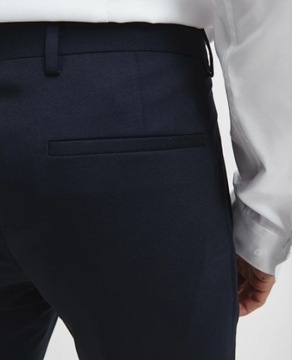 Granatowe eleganckie spodnie Calvin Klein 54