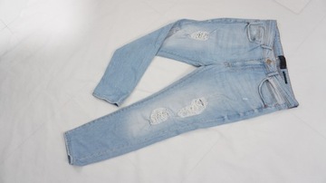 RESERVED spodnie jeansy z dziurami r 33 k2