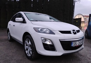 Mazda CX-7 2010 Mazda CX-7 2010r, 2.2 CDTI 4x4. Lekko uszkodzony lewy tyl. Jezdzi. 2.2