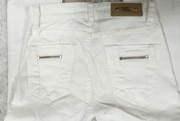 STRADIVARIUS jeansowe spodnie rurki dziury r34 S51